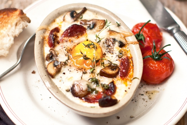 Baked eggs with spinach, mushrooms, goat’s cheese and chorizo